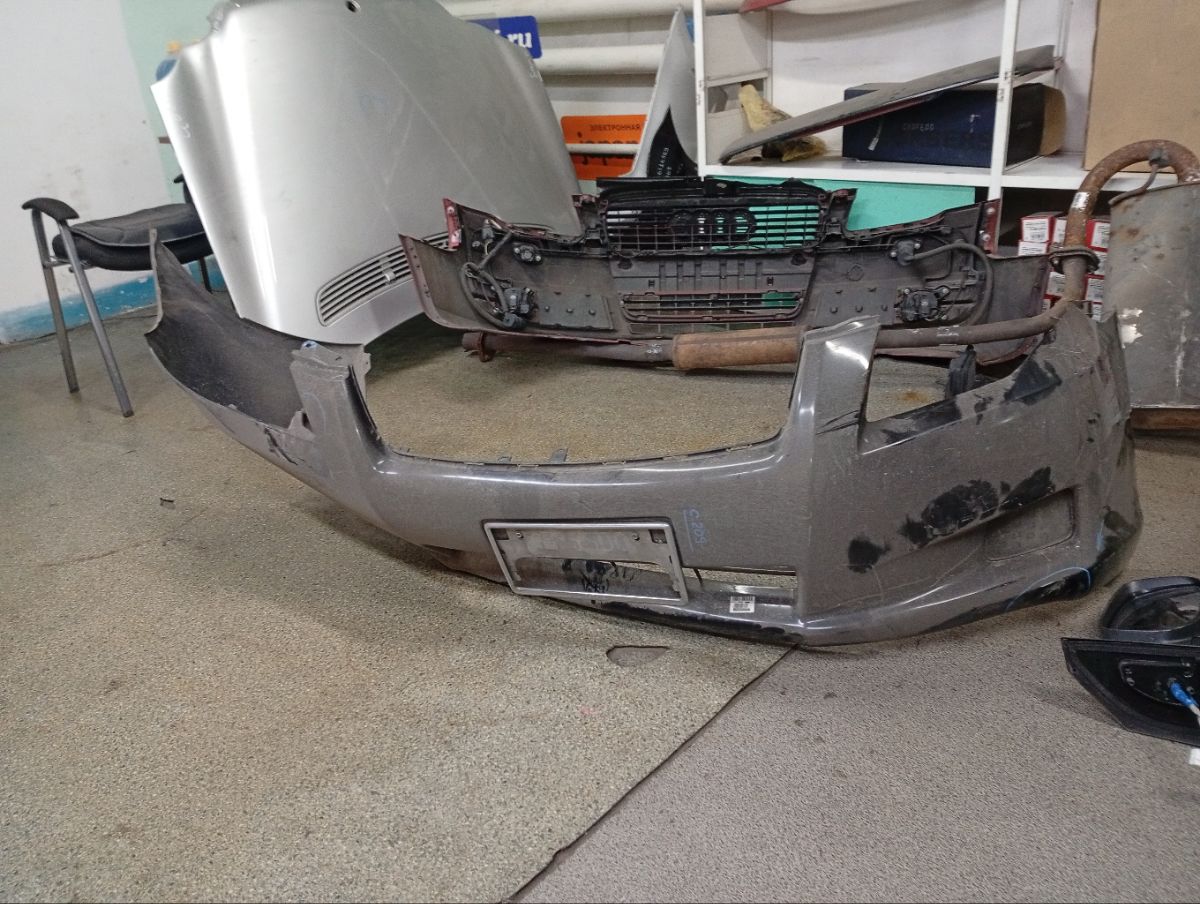 Бампер 52119-12B00 на Toyota Corolla Fielder NZE144G Фото 13