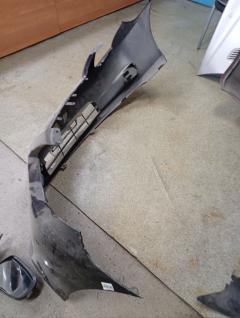 Бампер 52119-12B00 на Toyota Corolla Fielder NZE144G Фото 12