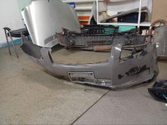 Бампер 52119-12B00 на Toyota Corolla Fielder NZE144G Фото 13