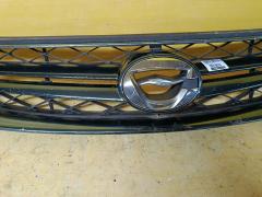 Решетка радиатора 53101-13210 на Toyota Corolla Fielder NZE144G Фото 2