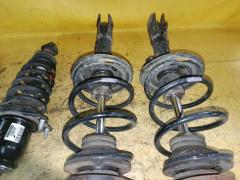 Стойка амортизатора на Toyota Corolla Fielder NZE144G 1NZ-FE Фото 4