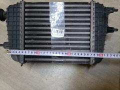 Радиатор интеркулера на Nissan Note E12 HR12DDR Фото 13