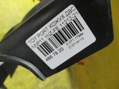Кожух ДВС 11212-21011 B1 на Toyota Porte NNP11 1NZ-FE Фото 3