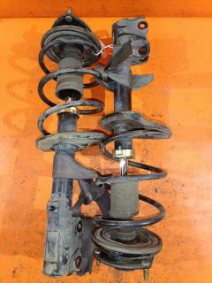 Стойка амортизатора на Mitsubishi Colt Z21A 4A90 333476  4060A198  MR594045  SST0165, Переднее расположение