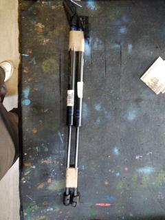 Амортизатор двери 90450-AU125 на Nissan Primera Wagon WTP12 Фото 2