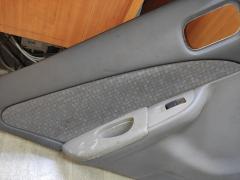 Обшивка двери на Nissan Sunny FB15 Фото 30
