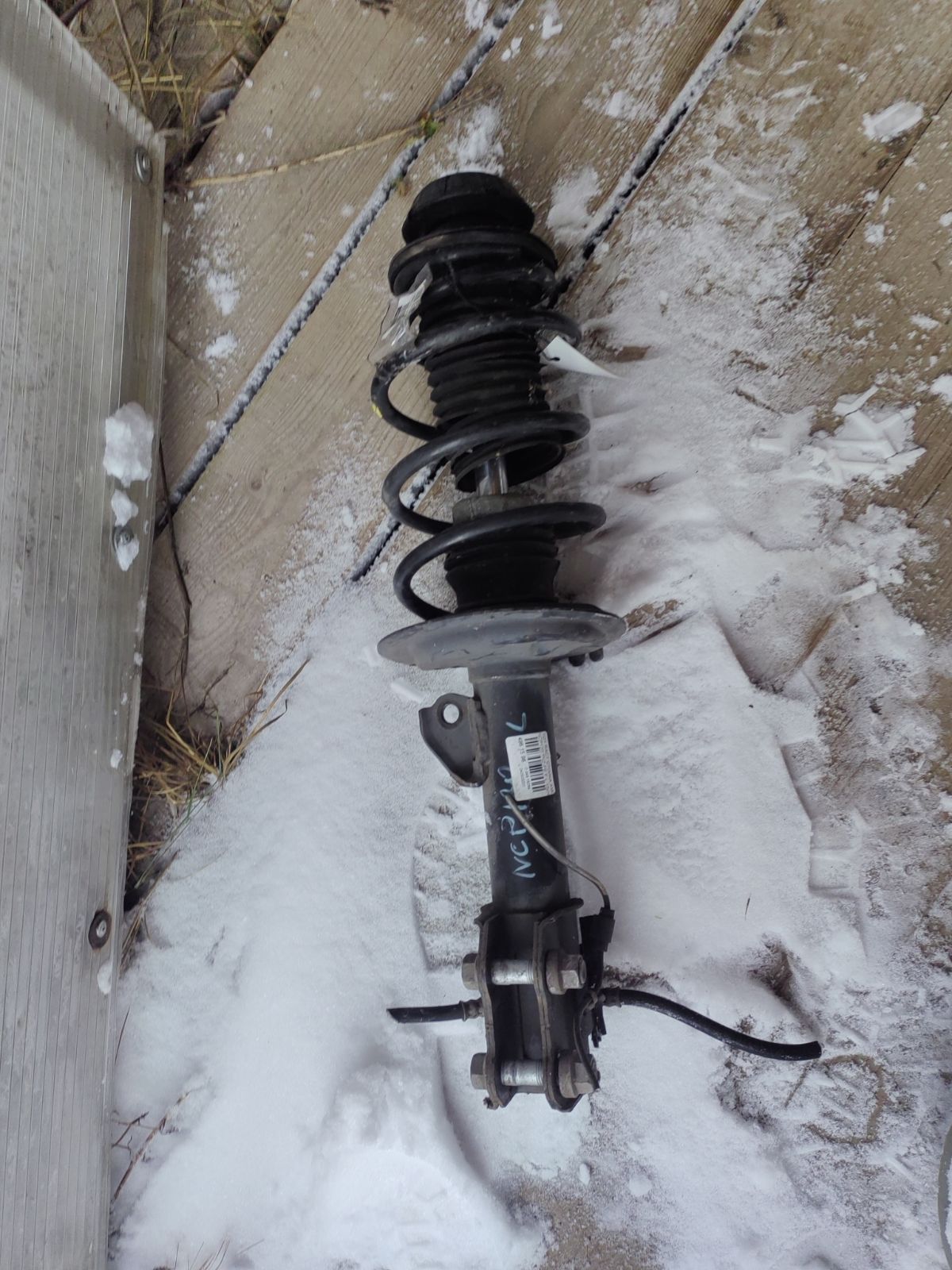 Стойка амортизатора на Toyota Ractis NCP120 1NZ-FE Фото 5