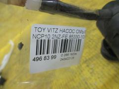 Насос омывателя стекла 85330-10290 на Toyota Vitz NCP10 2NZ-FE Фото 3