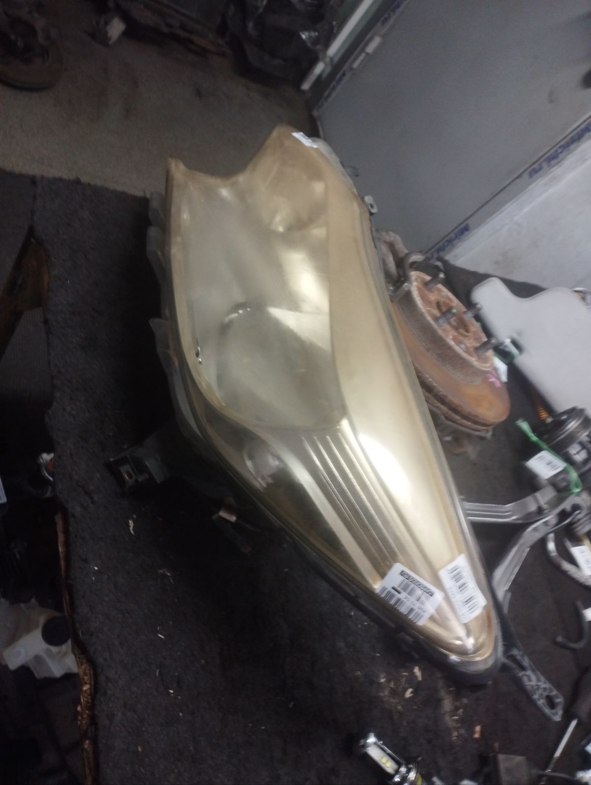 Фара 1868 1868 на Nissan Note E12 Фото 6