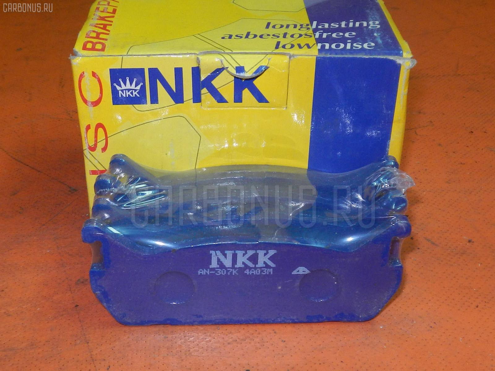 Тормозные колодки NKK PF5198K1 на Mazda Autozam Az-3 EC5SA Фото 1