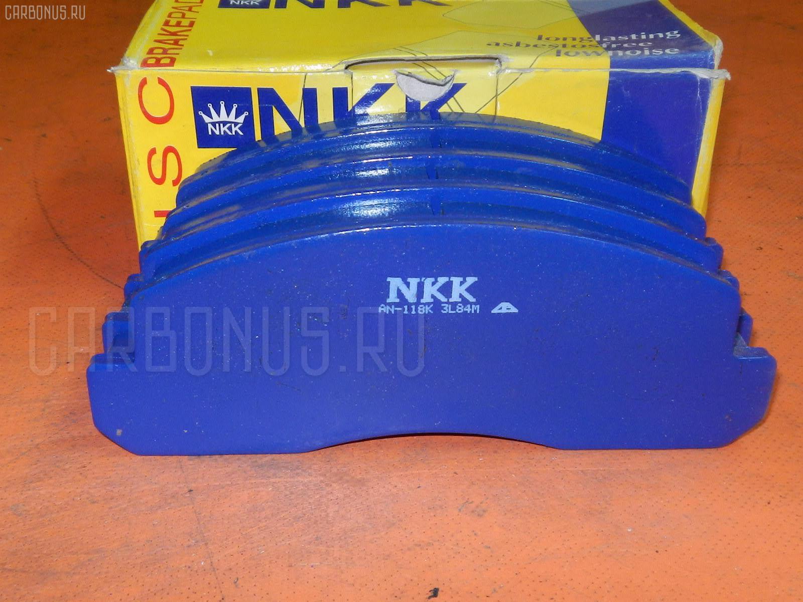 Тормозные колодки NKK PF1099M, 04465-36010, 04465-36020, 04465-36050, 04465-36070, 04465-37010, 04465-37030, 04465-37100, 04465-37150, 04465-37151, 04465-37250, 04491-36010, 04491-36030, 04491-36070, 2929601, 446537010, 446537151, 446537250, AFP530S, AFP535S, AFP78, AN-409WK, AN-626WK, AS-T103H, AS-T415M, AS-T476M, AY040-TY075, D2052-02, D2115M, D2115M-02, D2148M-02, MN-111, MN-390M, NDP-370C, PF-1099, PF-1329, PF-1388, PN1099, PN1329, PN1388, SN662P, SN663, SN663P, TD-086-2115, V9118A010, V9118A046, V9118A079 на Hino Dutro XZU304M Фото 1