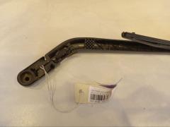 Держатель дворника 85241-B1010 на Toyota Passo QNC10 Фото 7