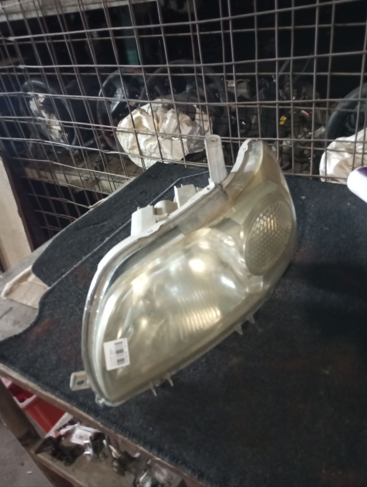 Фара 52-128 52-128,81150-52490 на Toyota Porte NNP10 Фото 4