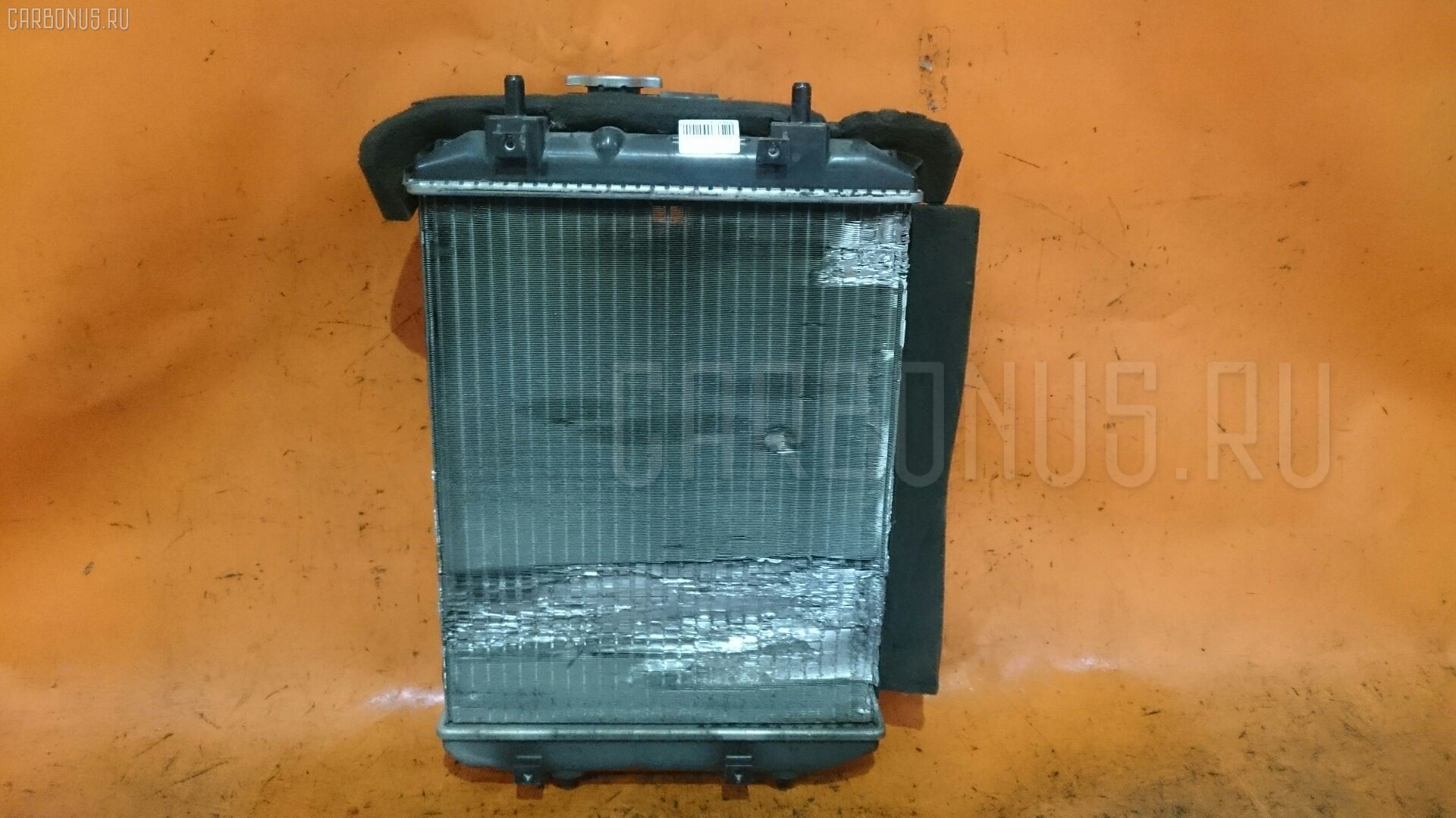 Радиатор ДВС 16400-B1020, 16400-B1021 на Toyota Passo KGC10 1KR-FE Фото 1