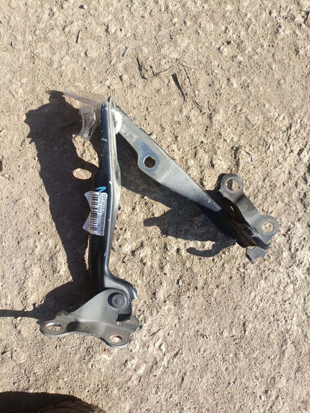Крепление капота 53410-52010, 53420-52010 на Toyota Vitz NCP10 Фото 4