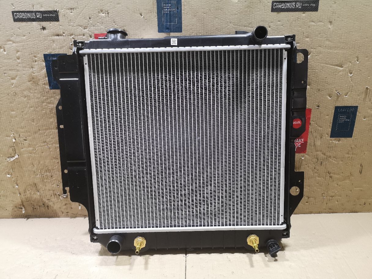 Радиатор ДВС TADASHI TD-036-5896, 05102983AA, 102132, 32318502, 5102983AA, 52028040, 52028041, 52028044, 52028123, 52028123AB, 52029121, 52029122, 52080 180, 52080 181, 52080 183, 520800186AC, 520800186AG, 52080180, 52080180AB, 52080180AE, 52080180AF, 52080181, 52080181AB, 52080181AF, 52080181AG, 52080183, 52080183AB, 52080183AC, 52080183AF, 52080183AG, 52080184, 52080184AB, 52080184AC, 52080184AG, 52080184AH, 52080186AG, 55037652AA, 55037653AA, 55037653AB, 55037653AC, 55037654AA, 55037654AB, 55037657AA, 55037658AA, 61036, CU2101, FX-036-5896, FX-036-5896A, K05102983AA, K52028123, K52080184AB, K52080186AC, K55037654AA, K55037654AB, TD-036-5896A на Jeep Wrangler TJ EPE Фото 1