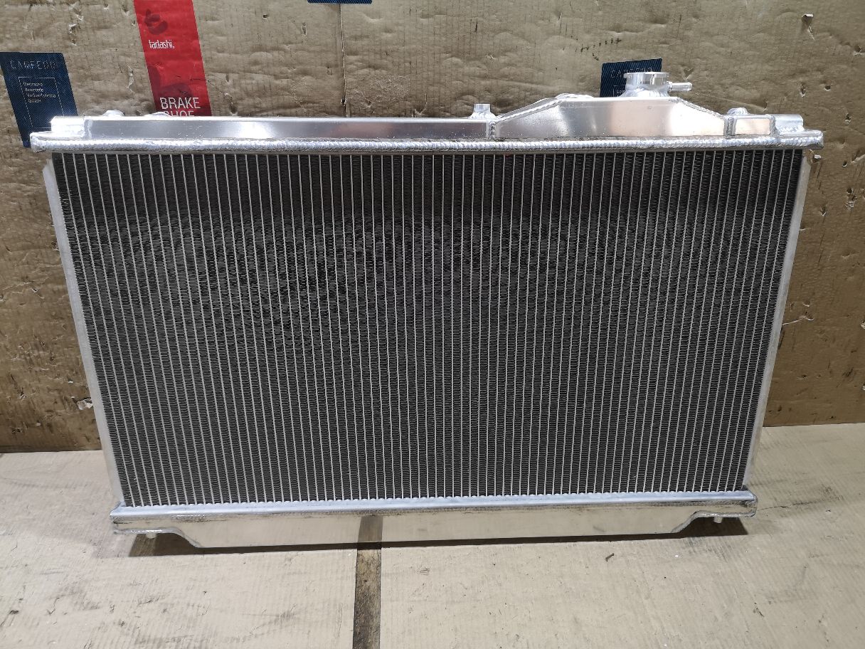 Радиатор ДВС TADASHI TD-036-0975A, 104383, 130087, 1461-0340, 16400-46310, 16400-46310-N1, 16400-46310-R1, 16400-46320, 16400-46320-N1, 16400-46320-R1, 1640046310, 1640046320, 210137N, 210138N, 31-3302, 31-3303, 53002346, 53002347, 60532346, 60532347, 734174, 734175, 812347R, 816108-2, 816108-4, ADT398146, ADT39884, CU1855, D1773, D1774, DBP177003, DBP177004, FX-036-0975, FX-036-0975A, FX-036-7048, FX-036-7048A, PA010413, PA010414, T156A84, T550-60, T550-61, T550-62, TD-036-0975, TD-036-7048, TD-036-7048A, TO2346, TO2347 на Toyota Supra JZA80 2JZ-GTE Фото 1