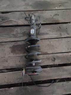 Стойка амортизатора 333428, 333473, 54303 EW81A, 54303 EX50A, 54303EW00A, 54303EW00B, 54303EW80A, 54303EW82A, 54303EW90B, CR-049-5433, E4303EW00A, E4303EW00B, E4303EX50A, E4C03EW00A, SJ-049-5433, SJ-049FL-G11, SST0173, ST-049-5433, ST-049FL-G11 на Nissan Bluebird Sylphy KG11 MR20DE Фото 5