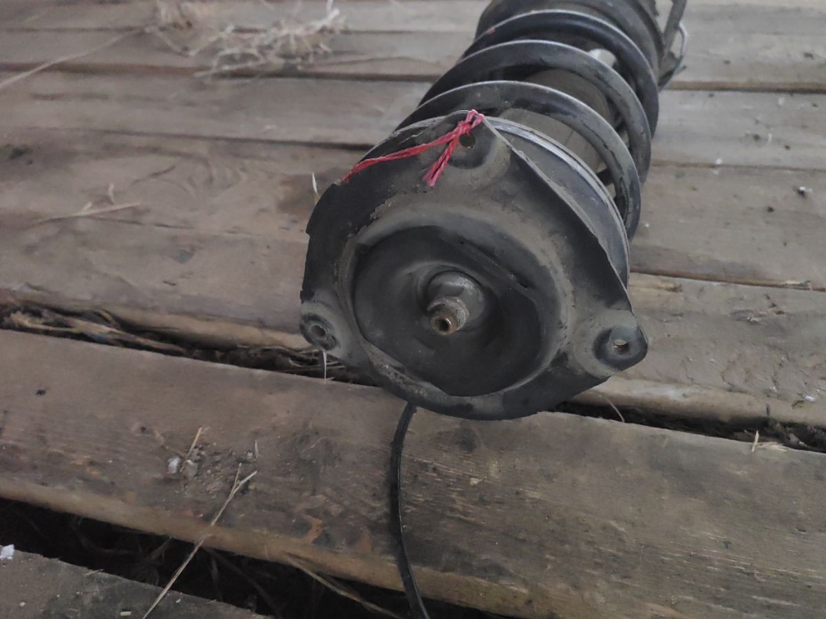 Стойка амортизатора 333428, 333473, 54303 EW81A, 54303 EX50A, 54303EW00A, 54303EW00B, 54303EW80A, 54303EW82A, 54303EW90B, CR-049-5433, E4303EW00A, E4303EW00B, E4303EX50A, E4C03EW00A, SJ-049-5433, SJ-049FL-G11, SST0173, ST-049-5433, ST-049FL-G11 на Nissan Bluebird Sylphy KG11 MR20DE Фото 6