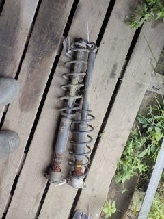 Амортизатор 1206032, 1209075, 1251758, 1305612, 1327469, 2S61-18008-AA, 2S61-18008-AC, 2S61-18008-AD, 2S61-18008-AE, 553308, CR-003R-DY3W, CR9024, D3502870XD, SJ-003R-DY3W, ST-003R-DY3W на Mazda Demio DY3W Фото 2