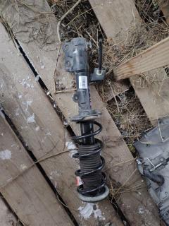 Стойка амортизатора на Nissan Note E12 HR12DDR Фото 3