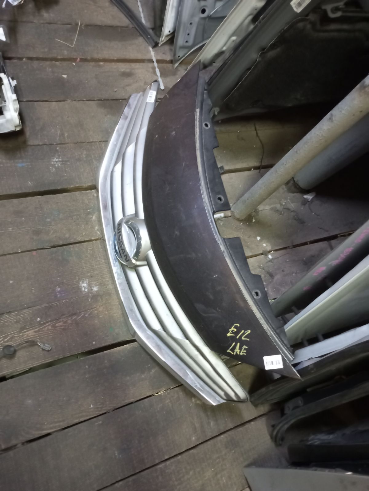 Решетка радиатора 62310-3VA0A на Nissan Note E12 Фото 5