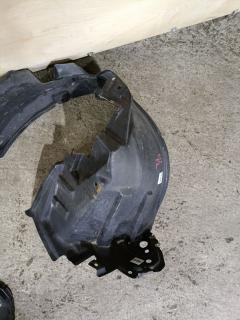 Подкрылок 63843-3VA0A на Nissan Note E12 HR12DDR Фото 2