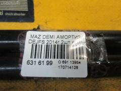 Амортизатор двери на Mazda Demio DJ3FS Фото 1