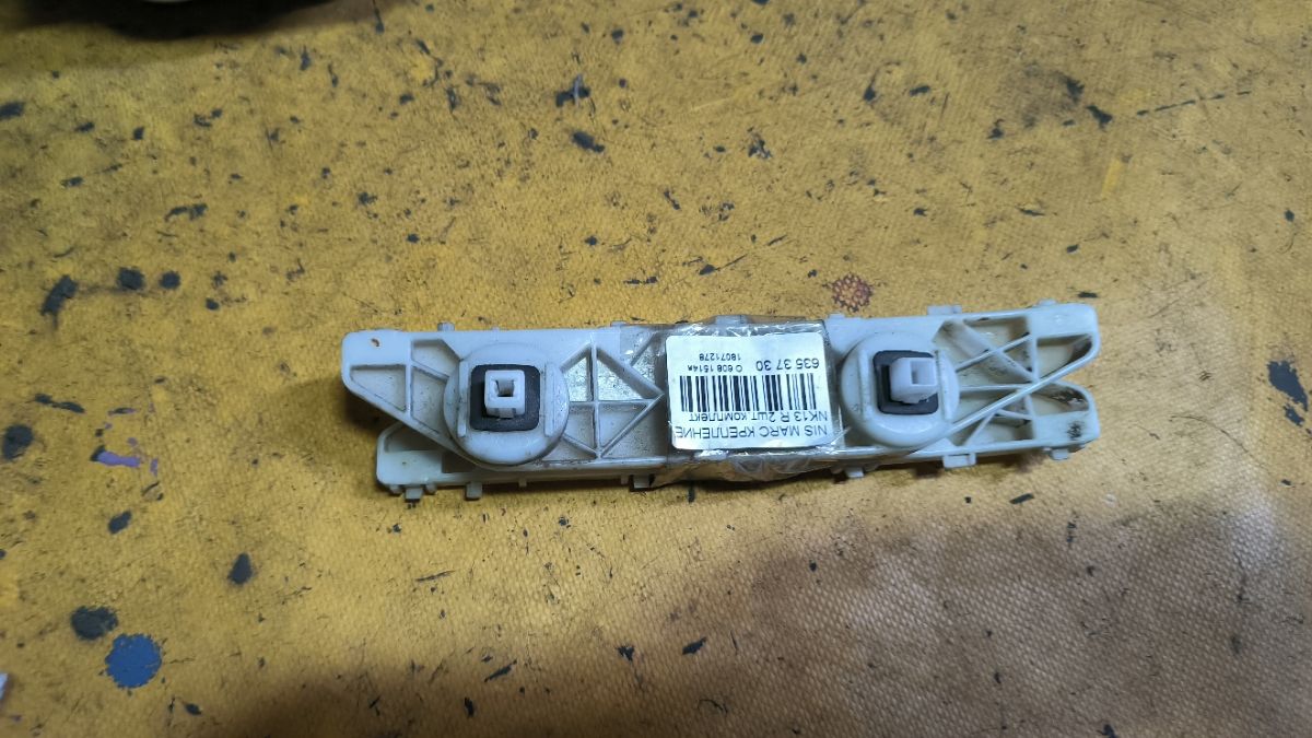 Крепление бампера на Nissan March NK13 Фото 2