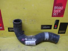 Патрубок радиатора ДВС 16571-23040 на Toyota Vitz SCP10 1SZ-FE Фото 1