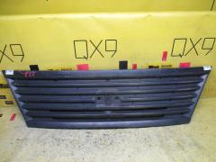 Решетка радиатора 62310-VX50A на Nissan Caravan VWME25 Фото 1