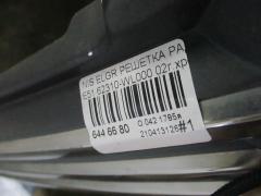 Решетка радиатора 62310-WL000 на Nissan Elgrand E51 Фото 3