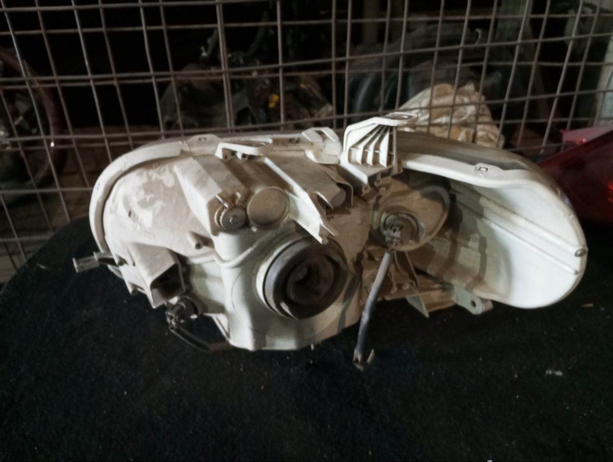 Фара 52-128 52-128 на Toyota Porte NNP10 Фото 9