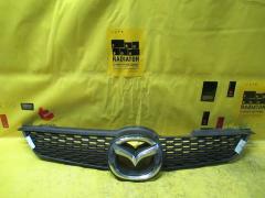 Вставка между фар на Mazda Demio DY3W D52-50-710