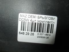 Брызговик на Mazda Demio DC5W Фото 2