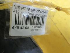 Брызговик на Nissan Note E12 Фото 2