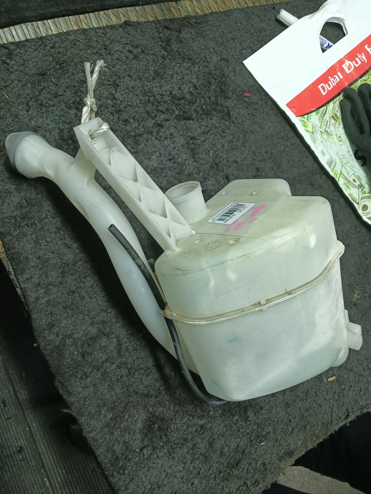 Бачок омывателя 28919AX000 на Nissan Note E11 Фото 5