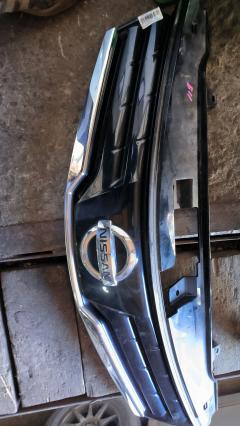 Решетка радиатора 62310-8Y20A на Nissan Note E11 Фото 3