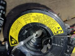 Переключатель поворотов на Toyota Ipsum ACM21W Фото 9