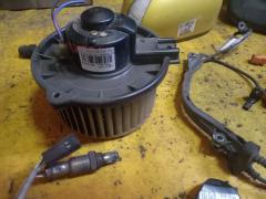 Мотор печки 87103-12050 на Toyota Caldina AZT241W Фото 4