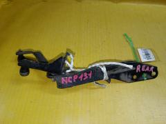 Датчик регулировки наклона фар на Toyota Vitz NCP131 89407-52140, Заднее расположение