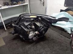 Фара 28-203 28-203 на Toyota Voxy ZRR70G Фото 12