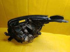 Фара 28-203 28-203 на Toyota Voxy ZRR70G Фото 8