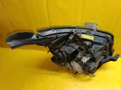 Фара 28-203 28-203 на Toyota Voxy ZRR70G Фото 7