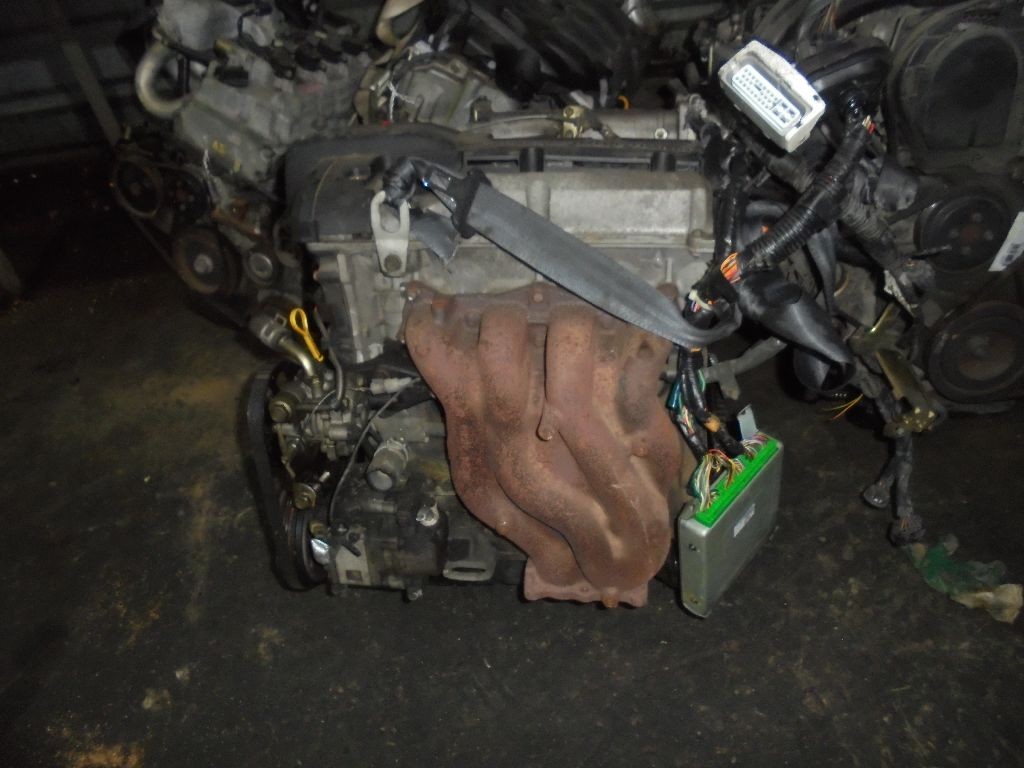 Двигатель на Mazda Familia S-Wagon BJ5W ZL-VE Фото 11