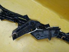 Крепление бампера 52575-13060, 52576-13060, 52563-13030, 52562-13060 на Toyota Corolla Fielder NZE144G Фото 2