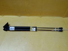 Амортизатор двери на Toyota Corolla Fielder NZE164G