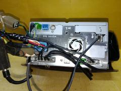 Автомагнитофон B8260-7997D на Nissan March AK12 Фото 7