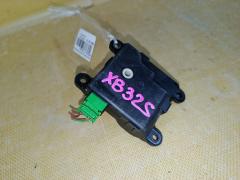 Моторчик заслонки печки на Suzuki Splash XB32S K12B Фото 2