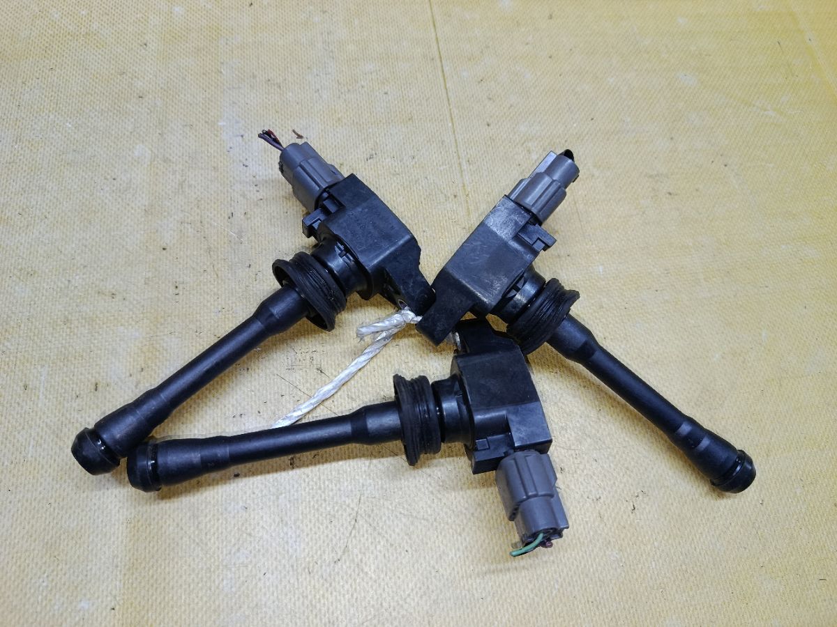 Катушка зажигания 22448-1KT0A на Nissan Note E12 HR12DDR Фото 1